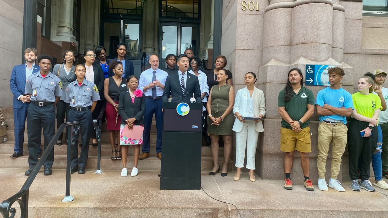 City leaders gather outside City Hall to announce a new youth career program. (Casey Weldon/Spectrum News 1)