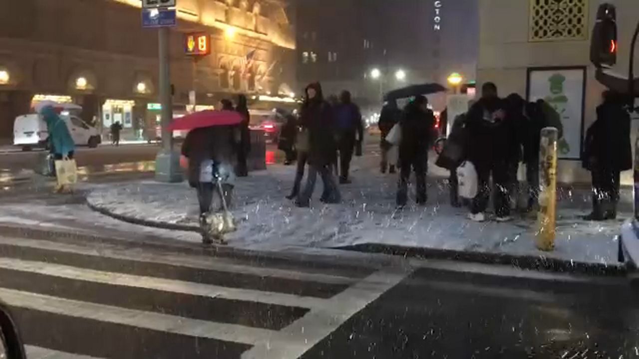 More light snowfall hits NYC