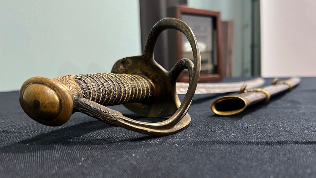 The sword and scabbard of Civil War Union Gen. William Tecumseh Sherman is displayed at Fleischer's Auctions, Thursday, May 9, 2024, in Columbus, Ohio. The wartime sword, likely used between 1861 and 1863, are among the items that will be open to bidders Tuesday, May 14, 2024. (AP Photo/Patrick Orsagos)