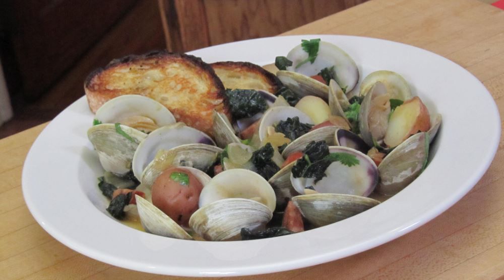 Steamed Littleneck Clams with Chorizo, Potatoes and Kale