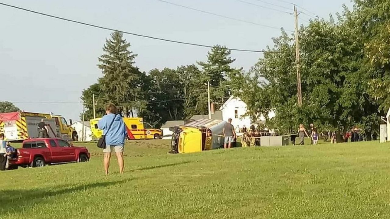 Ambulances respond to the scene of the accident. (Spectrum News 1/Brandon Coello Amaya)