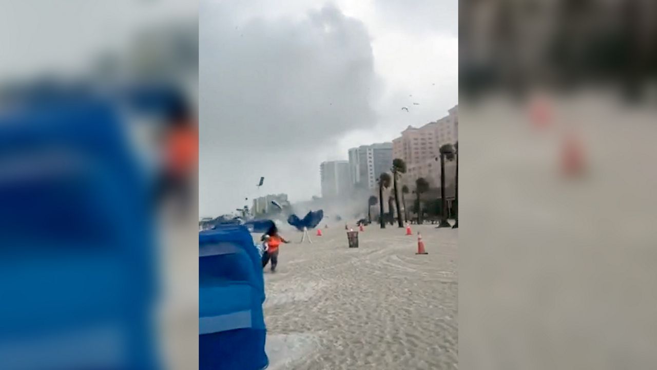 Officials in Clearwater say two people were injured by flying debris kicked up when a waterspout moved ashore Friday afternoon. (Clearwater Fire & Rescue Department via Twitter)