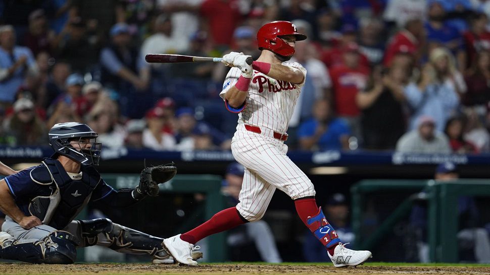 Philadelphia Phillies' Kody Clemens, right, watches his walkoff single off Tampa Bay Rays' Garrett Cleavinger during the ninth inning of a baseball game, Monday, Sept. 9, 2024, in Philadelphia. (AP Photo/Derik Hamilton)