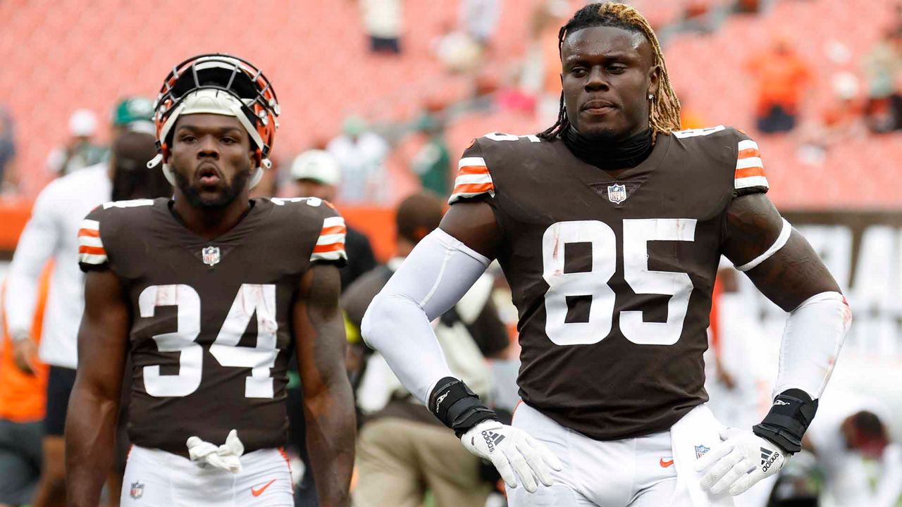 Cleveland Browns running back Jerome Ford (34) and tight end David Njoku (85) walk from the field after losing to the New York Jets in an NFL football game, Sunday, Sept. 18, 2022, in Cleveland. (AP Photo/Ron Schwane)