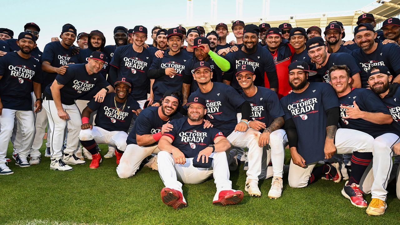 The Cleveland Guardians celebrate after their 10-inning win over the Minnesota Twins in a baseball game, Thursday, Sept. 19, 2024, in Cleveland. (AP Photo/Nick Cammett)