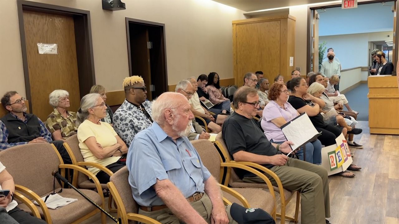 Cleveland Heights residents filled city council chambers on the night the city voted to put a recall on the September ballot for the city's first mayor, Kahlil Seren. (Spectrum News/Kimberly Perez)