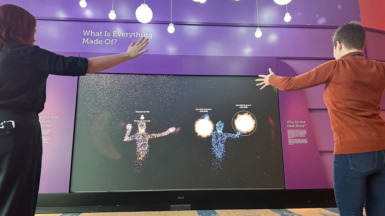 The “We Are Stardust” interactive experience demonstrates how the components that formed the universe are within us all.