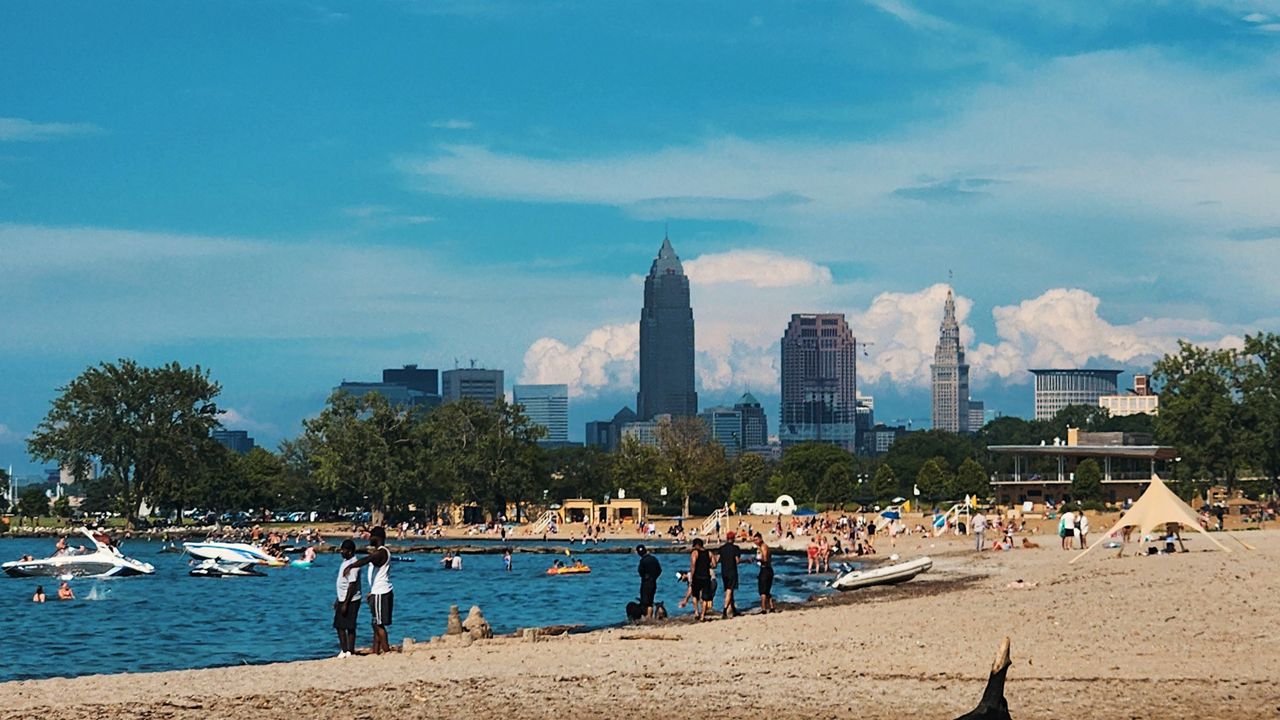 Beachgoers enjoy the warm weather at Edgewater Park.