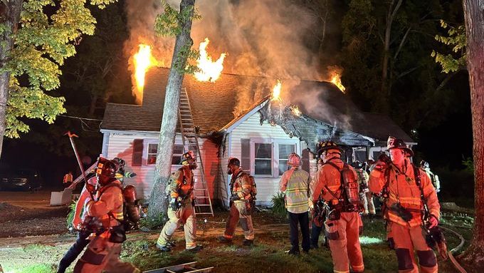 Crews work to put out a two-alarm fire in Charlotte early Thursday morning. Three firefighters were hurt while working to put out the blaze. (Courtesy Charlotte Fire Department)