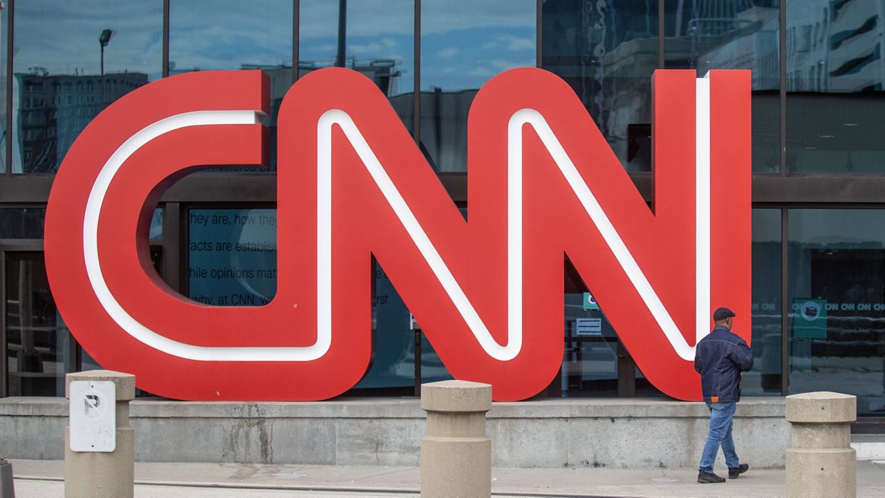 The CNN logo is displayed at the entrance to the CNN Center in Atlanta. (AP Photo/Ron Harris)