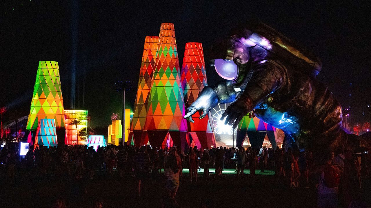 Festivalgoers attend the Coachella Music & Arts Festival at the Empire Polo Club on Saturday, April 13, 2019, in Indio, Calif. (Photo by Amy Harris/Invision/AP)