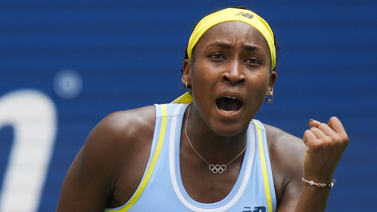 Coco Gauff, of the United States, reacts after scoring a point against Varvara Gracheva, of France, during the first round of the U.S. Open tennis championships, Monday, Aug. 26, 2024, in New York. (AP Photo/Seth Wenig)