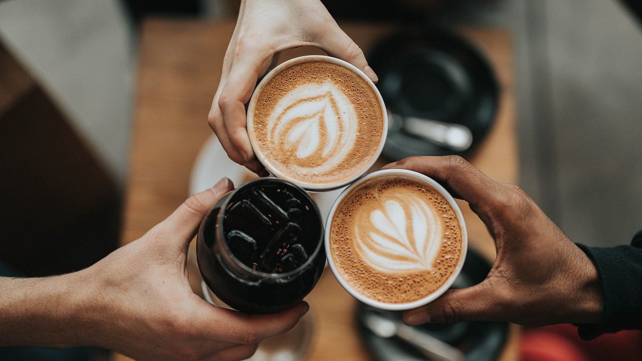 File image of people holding coffee drinks. (Pixabay)