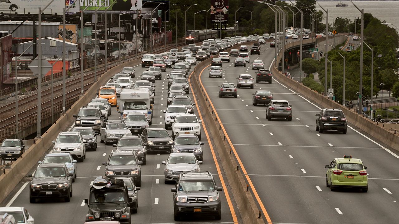 Traffic crawls on the northbound lanes of the Henry Hudson Parkway leading out of Manhattan, Friday, May 26, 2017, in New York. (AP Photo/Julie Jacobson)