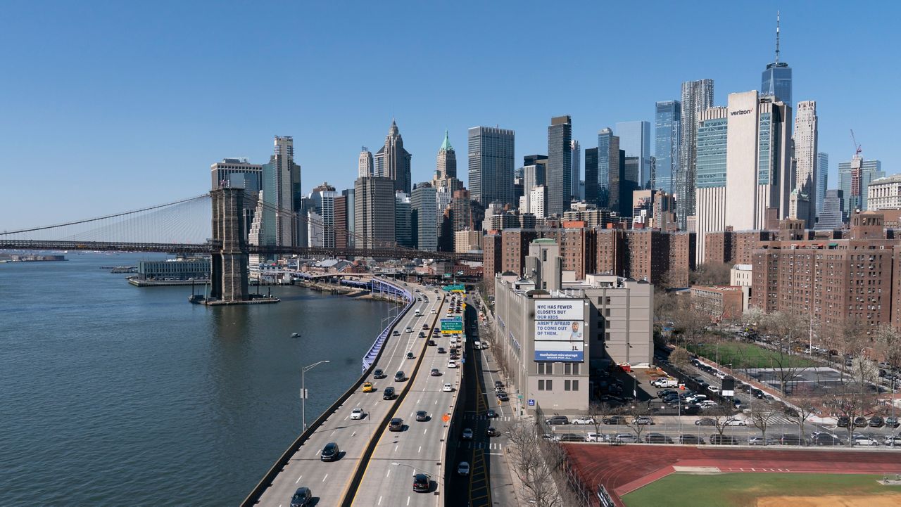 Vehicles drive along the FDR Drive in New York, part of the city's aging infrastructure, Tuesday, April 6, 2021. (AP Photo/Mark Lennihan)