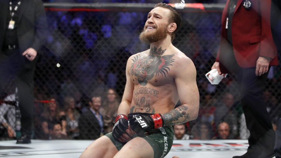 Conor McGregor smiles after defeating Donald "Cowboy" Cerrone during a UFC 246 welterweight mixed martial arts bout Saturday, Jan. 18, 2020, in Las Vegas. (AP Photo/John Locher)