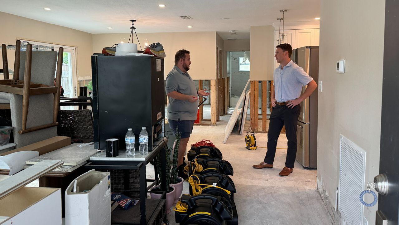 David Clements (right) consults with his contractor, Tommy Whitehead (left). (Spectrum News/Melissa Eichman)