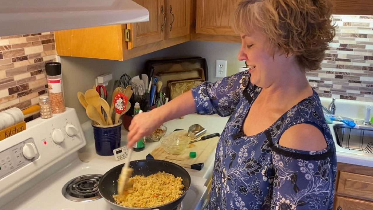 Mum-of-five spends £60 giving her bland kitchen a psychedelic