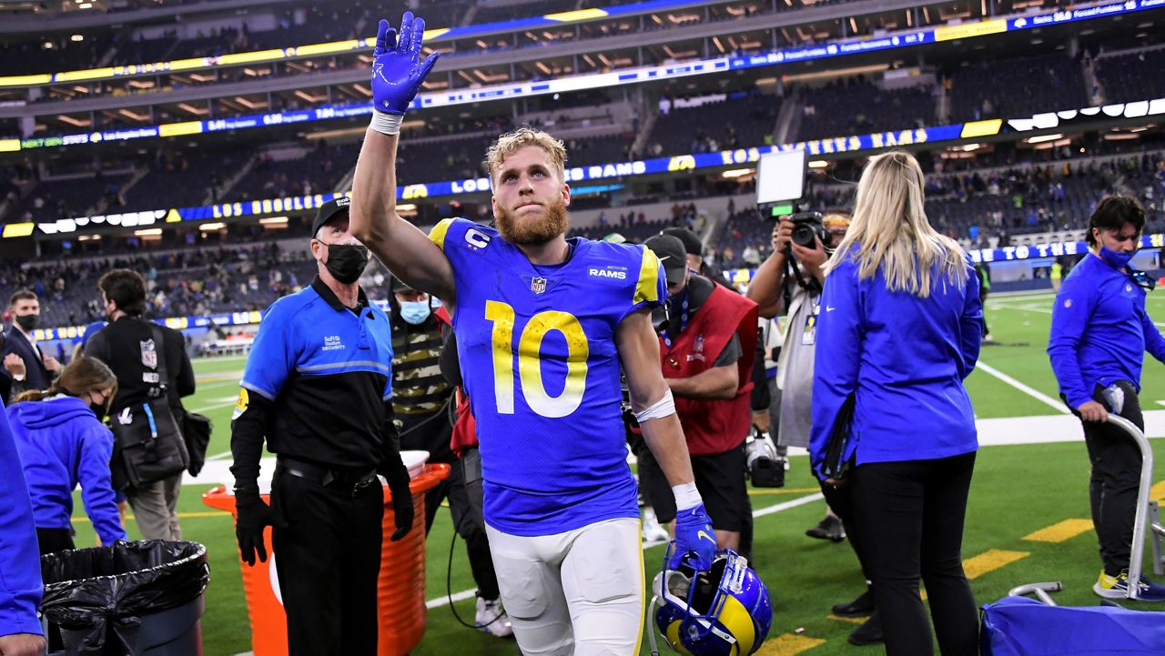 Los Angeles Rams wide receiver Cooper Kupp walks off the field after a win over the Seattle Seahawks during an NFL football game Tuesday, Dec. 21, 2021, in Inglewood, Calif. (AP Photo/Kevork Djansezian)