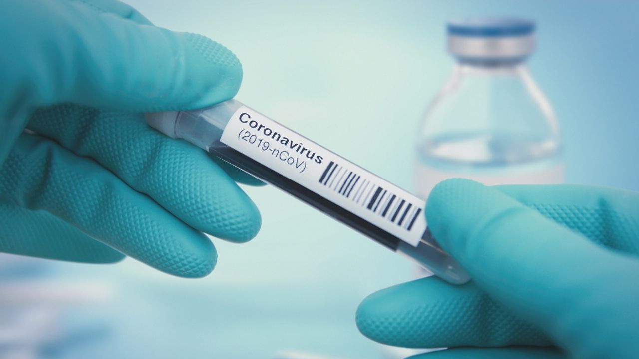 vial with coronavirus written on the side