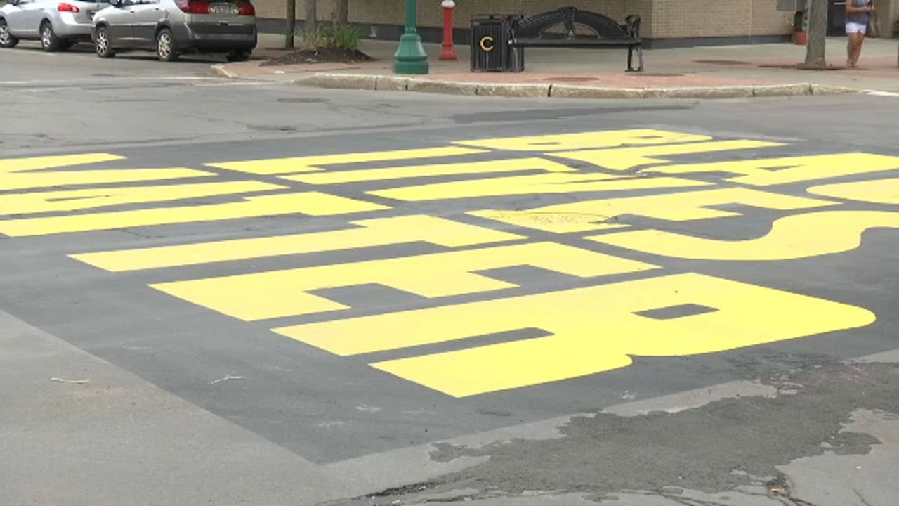 An image of "Black Lives Matter" painted on the street