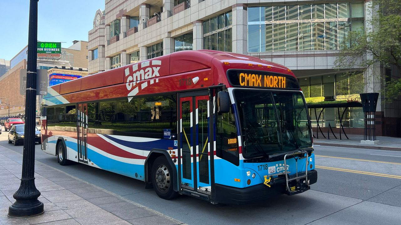 The CMAX bus, part of the Central Ohio Transit Authority (COTA), drives on South High Street in Columbus, Ohio on Monday, April 22, 2024.