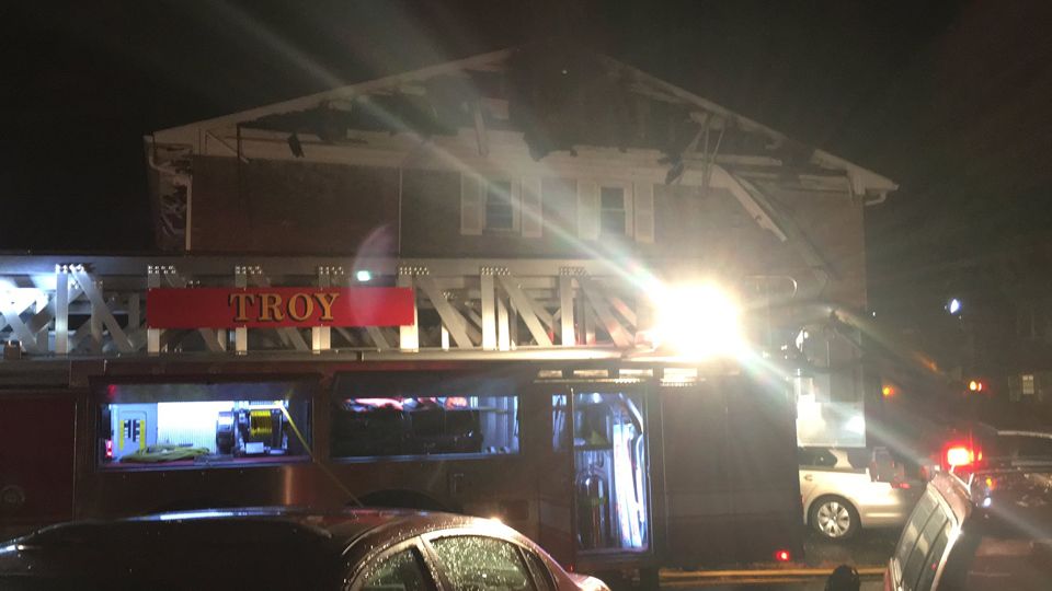 Investigation continues into cause of Troy apartment building fire