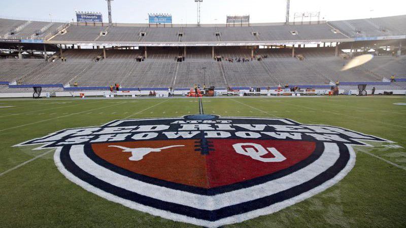 FILE - In this Oct. 10, 2020, file photo, The Red River Showdown logo is displayed on the field of the Cotton Bowl, prior to an NCAA college football game between the University of Texas and Oklahoma, in Dallas. (AP Photo/Michael Ainsworth, File)