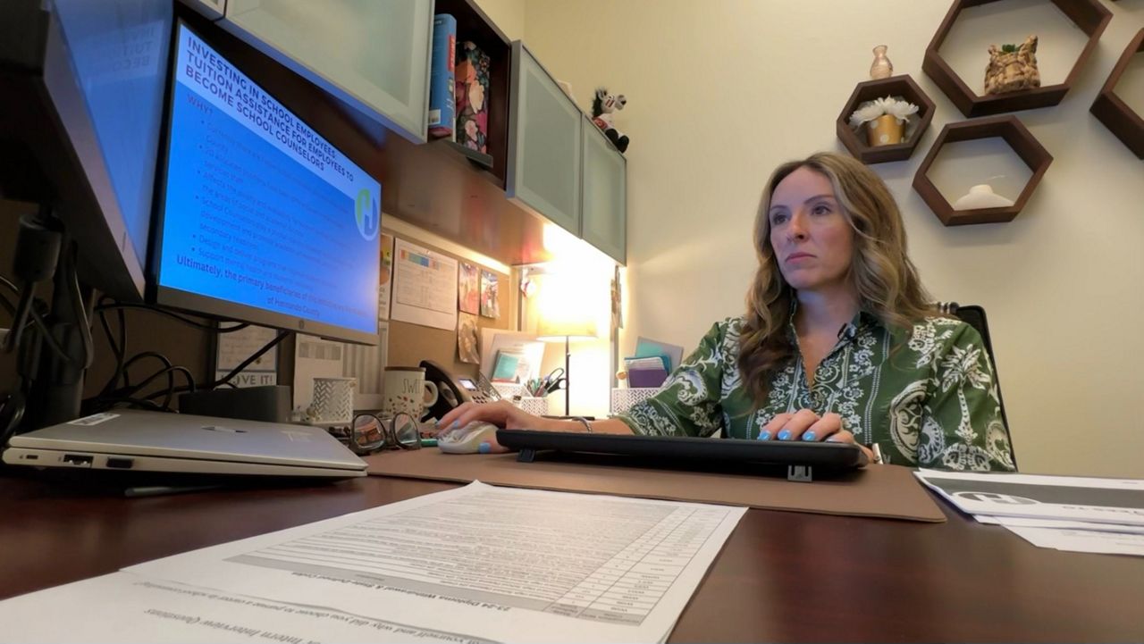 Carrie Wilson, Hernado County School District supervisor of school counseling services, explains a proposal that would help recruit and retain guidance counselors internally. (Spectrum News/Eugene Buenaventura)