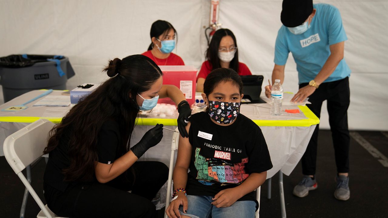 Children 12 and older receiving the COVID-19 vaccine. (FILE)