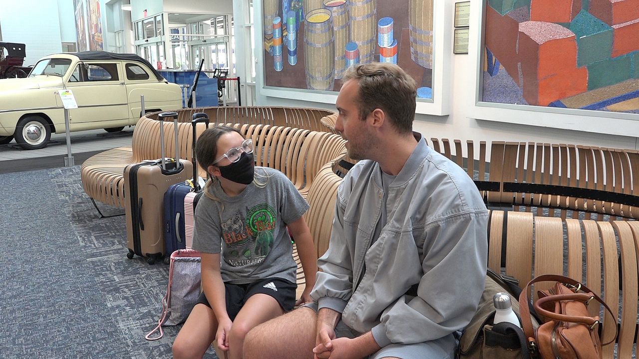 Some passengers at Greater Cincinnati Airport aren't sure about the U.S. decision to drop Covid tests for international arrivals.