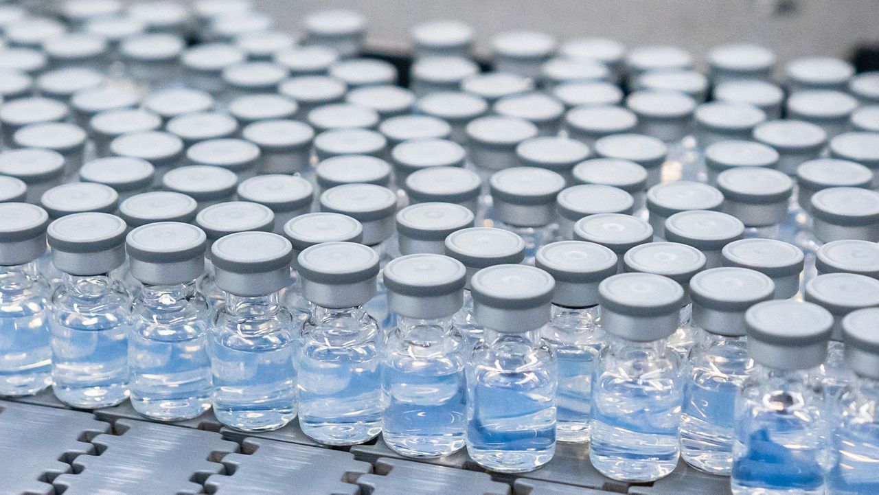 This photo provided by Pfizer shows vials of the company's updated COVID-19 vaccine during production in Kalamazoo, Mich. (Pfizer via AP)