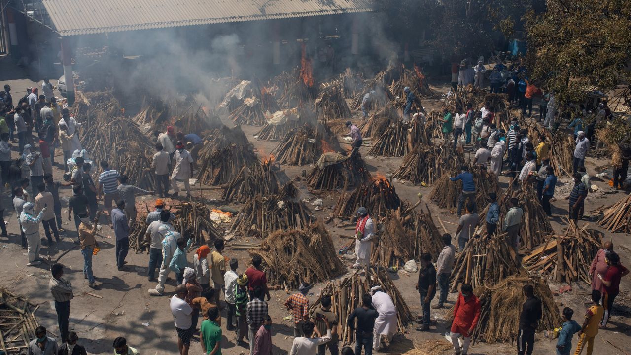 Multiple funeral pyres of those who died of COVID-19 burn at a ground that was converted into a crematorium for the mass cremation of coronavirus victims in New Delhi, India, on April 24, 2021. (AP Photo/Altaf Qadri, File)