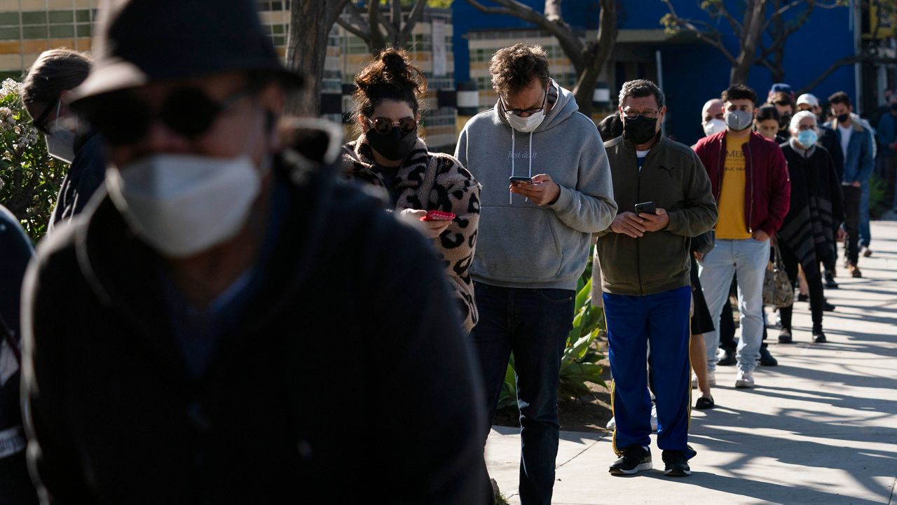 People wait in line for COVID-19 tests in Los Angeles on Jan. 4. (AP Photo/Jae C. Hong, File)