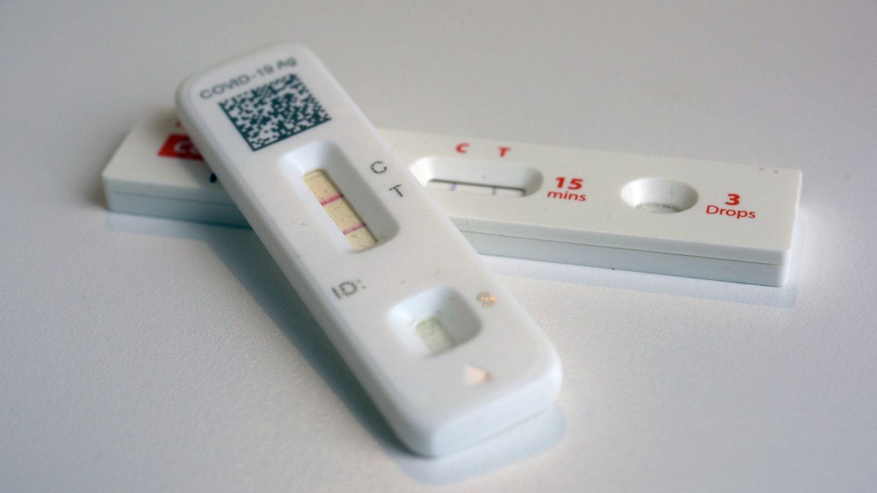 COVID-19 antigen home tests indicating a positive result are photographed in New York, April 5, 2023. (AP Photo/Patrick Sison, File)