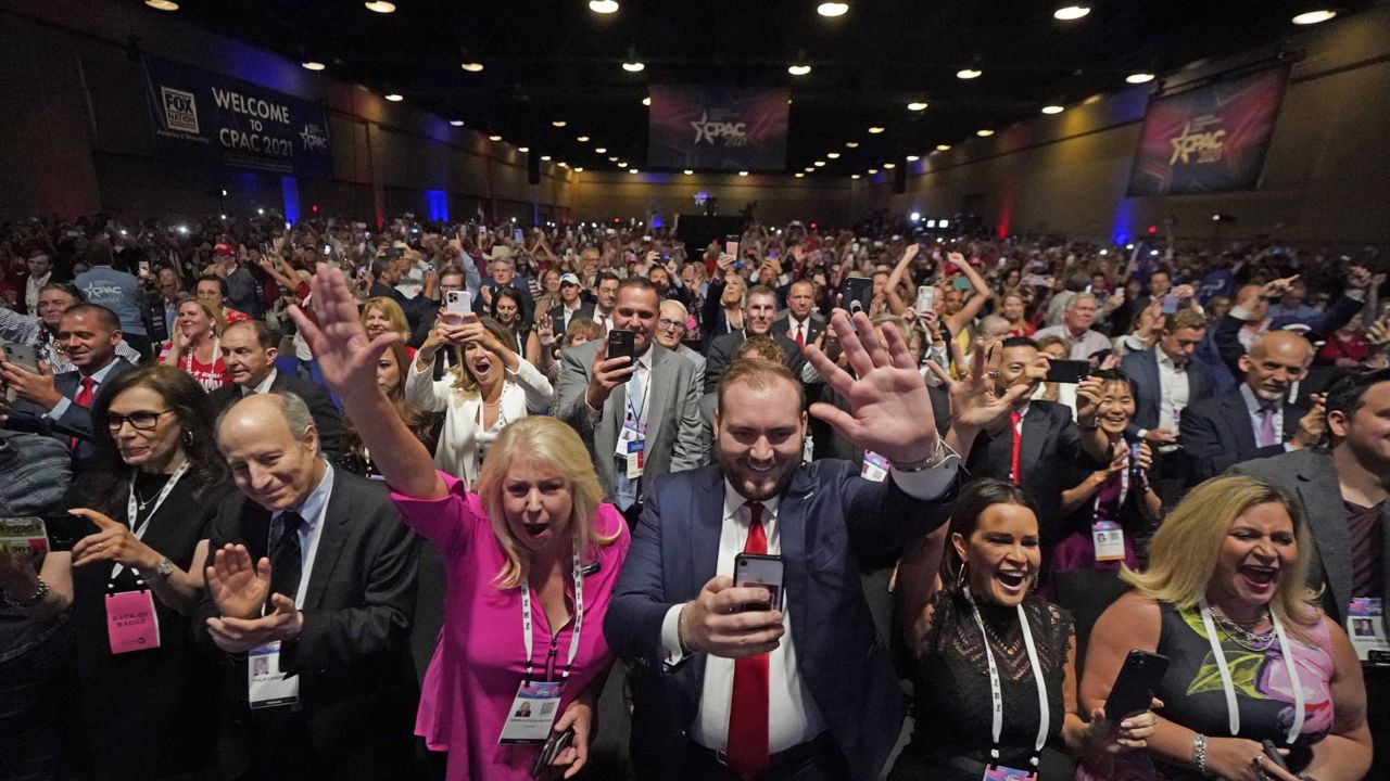 People cheer as former president Donald Trump speaks at the Conservative Political Action Conference (CPAC) Sunday, July 11, 2021, in Dallas. (AP Photo/LM Otero)