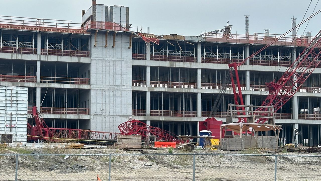 The crane was over the unfinished Cape Canaveral Hospital at 255 Borman Drive when the incident happened around 2 p.m. (Spectrum News/Massiel Leyva)