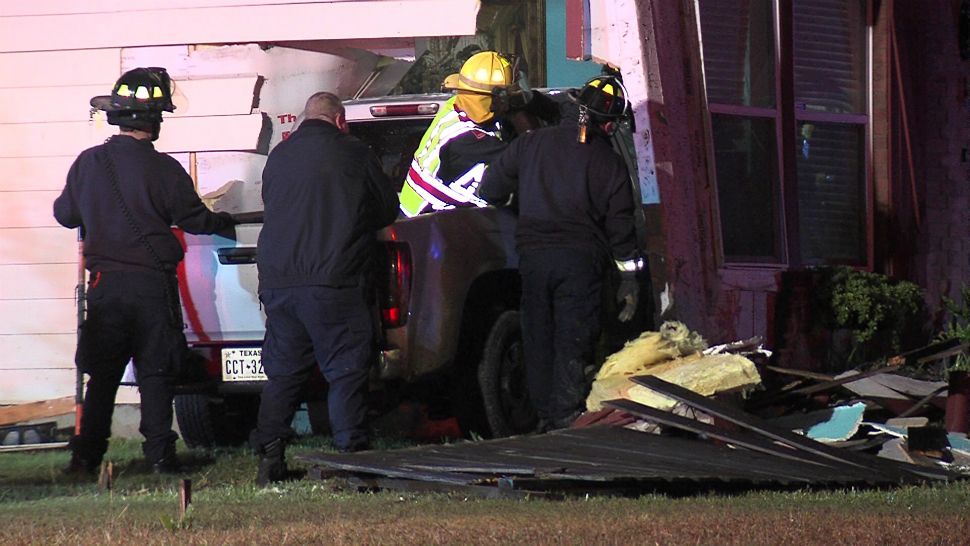 Driver loses control, crashes into house