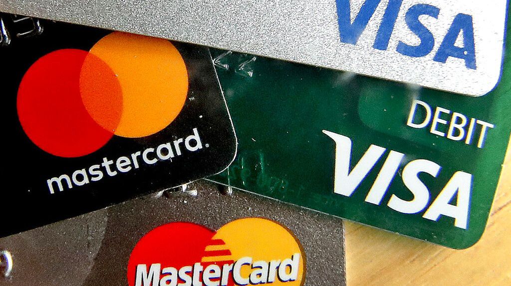 Credit cards are displayed in this Feb. 20, 2019 file photo. (AP Photo/Keith Srakocic, File)