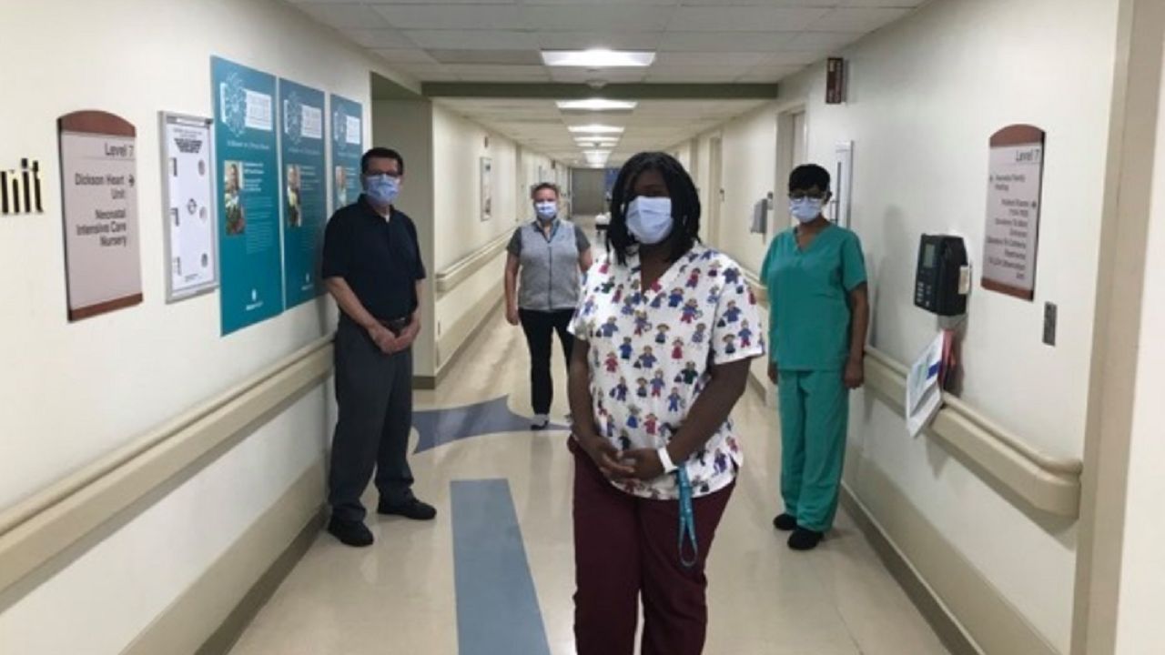 Hospital Cleaning Staff Work Hard to Keep Everyone Safe