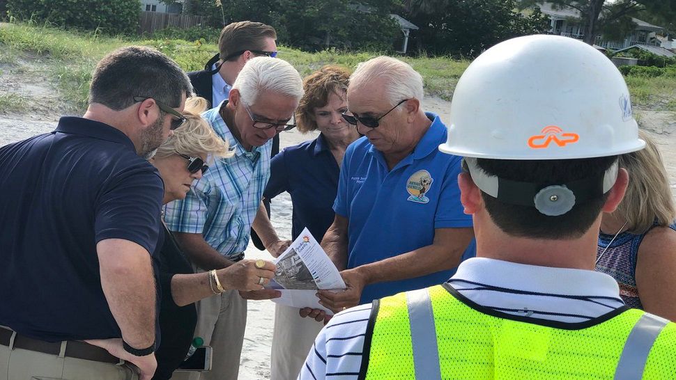 On Thursday, U.S. Rep. Charlie Crist, along with Pinellas County officials walked the beach to monitor a beach nourishment project. (Trevor Pettiford, staff)