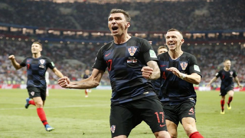 Croatia’s Mario Mandzukic celebrates after scoring his side’s second goal during the semifinal match between Croatia and England at the 2018 soccer World Cup in the Luzhniki Stadium in Moscow, Russia, Wednesday, July 11, 2018. (AP Photo/Frank Augstein)