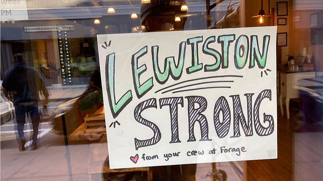 A cafe shows its support for the community a day after the body of Robert Card was found Saturday, Oct. 28, 2023 in Lewiston, Maine. Card, a firearms instructor who grew up in the area, was found dead in nearby Lisbon Falls, Gov. Janet Mills said at a Friday night news conference. (AP Photo/ Jake Bleiberg)