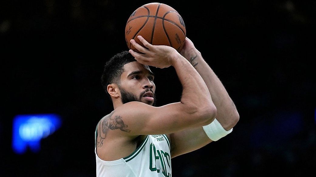 Boston Celtics forward Jayson Tatum (0) looks to take a foul shot in the first half of an NBA basketball game against the Atlanta Hawks, Sunday, Nov. 26, in Boston. (AP Photo/Steven Senne)