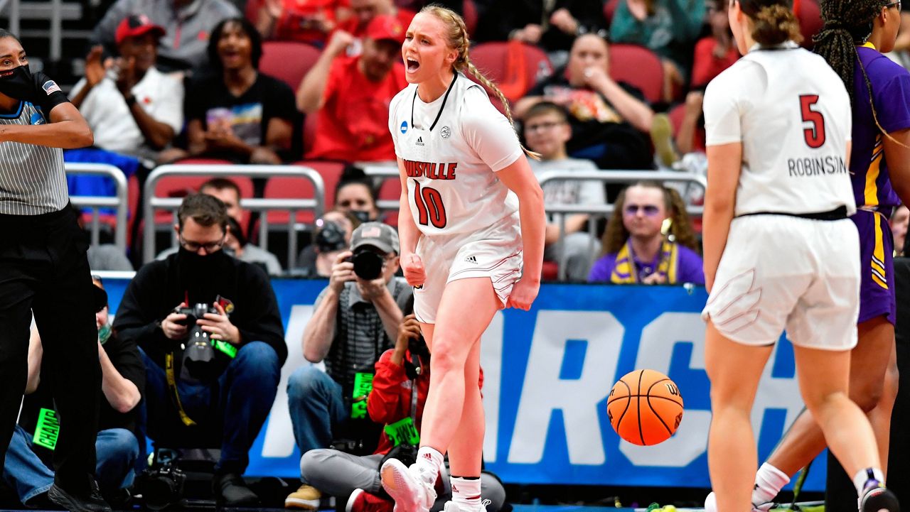 Louisville guard Hailey Van Lith (10) celebrates after scoring and getting fouled during the first half of their women's NCAA Tournament college basketball first round game against Albany in Louisville, Ky., Friday, March 18, 2022. (AP Photo/Timothy D. Easley)