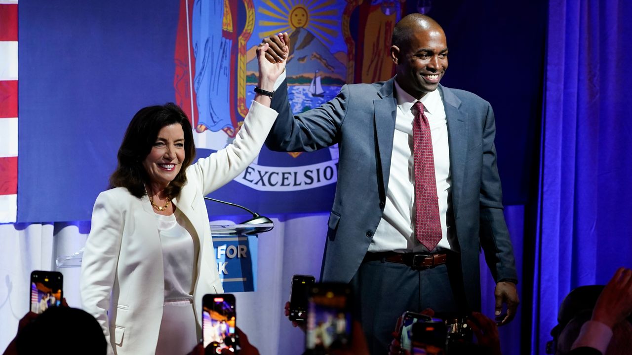 New York, United States. 27th June, 2022. Governor Kathy Hochul greets  young boy during campaign stop alone with Lieutenant Governor Antonio  Delgado in Washington Heights. Antonio Delgado is running for Lieutenant  Governor