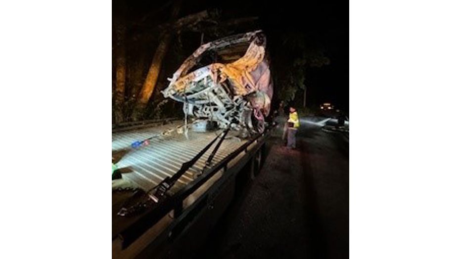 The remnants of a Maine State Police cruiser are hauled off following a crash in Oxford. (Maine Department of Public Safety)