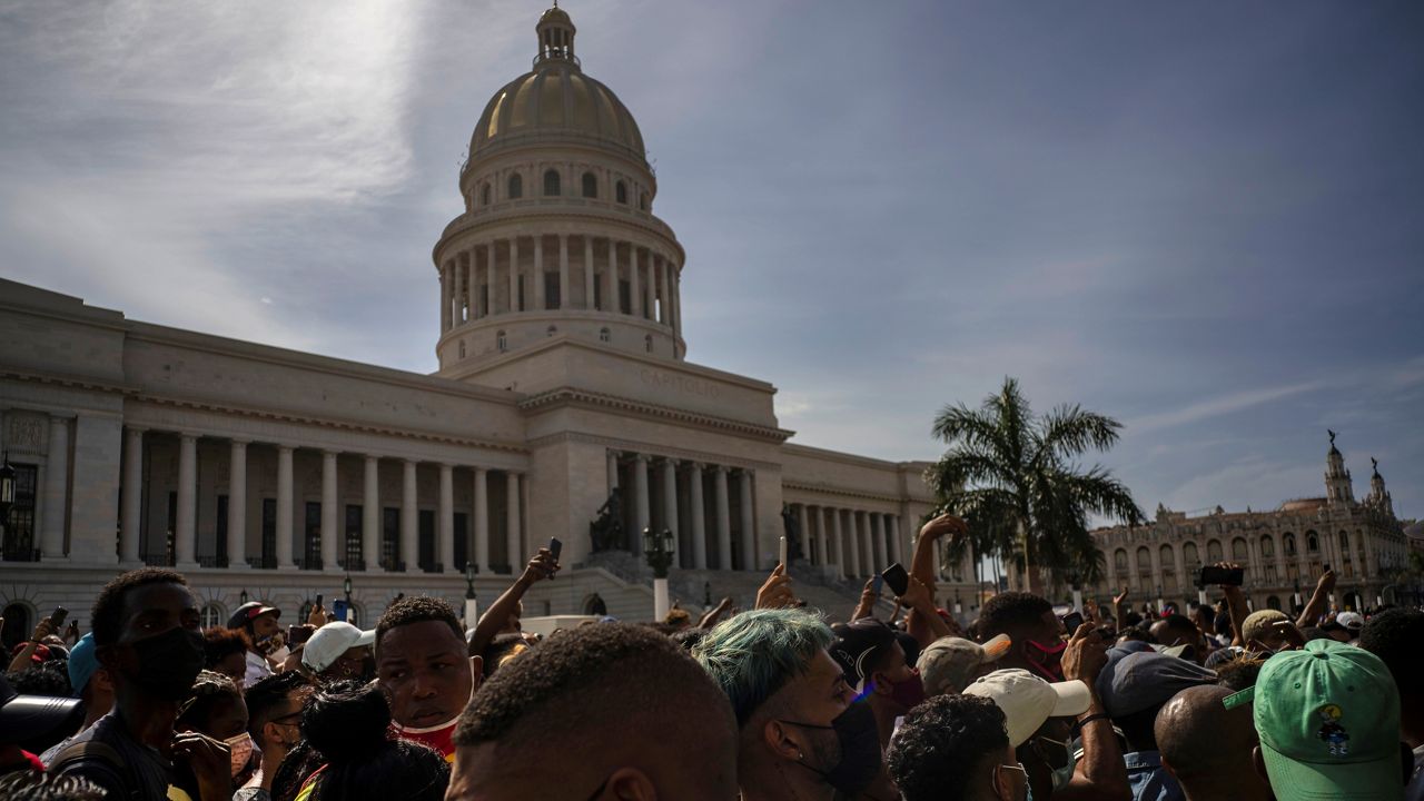 Protesters gather in front of the Capitol in Havana, Cuba. (AP/Ramon Espinosa)