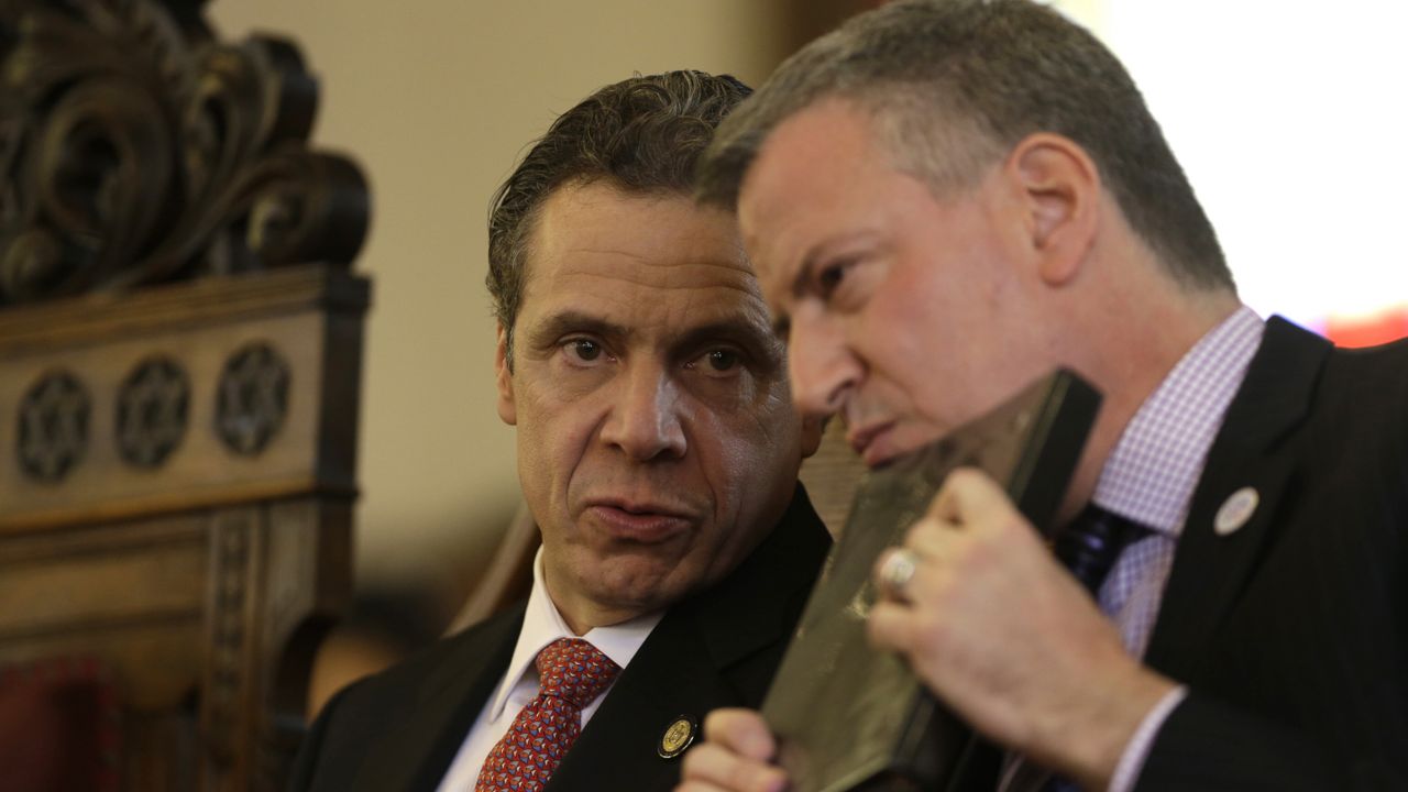 Gov. Andrew Cuomo and Mayor Bill de Blasio in Albany in February 2014. (AP Photo/Mike Groll)