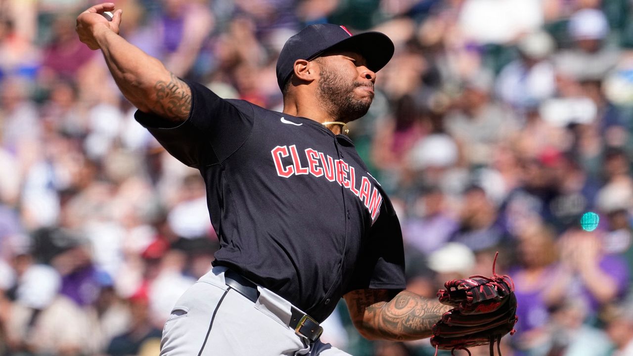 Cleveland Guardians starting pitcher Xzavion Curry throws against the Colorado Rockies during the fourth inning of a baseball game Monday, May 27, 2024, in Denver. (AP Photo/Jack Dempsey)